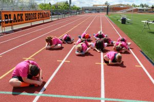 Fun run participants warm up