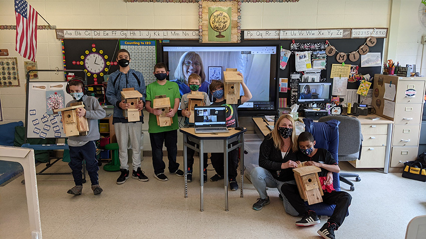 Students with their completed projects