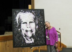 Beth Bayer with her mural