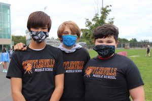 students wearing a middle school tshirt