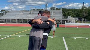 PFC Justin Decker surprises his younger brother Bradley.