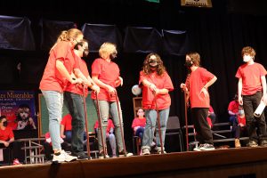 Middle school students rehearse for the spring 2022 drama club production.