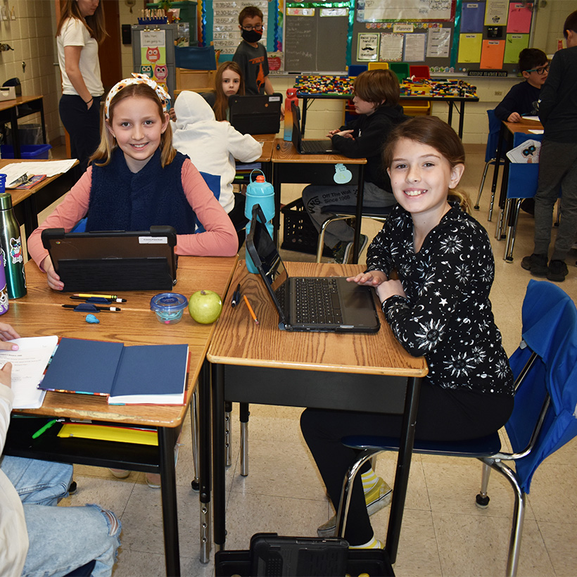 Elementary students working on their chromebooks