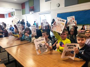 Students gather to hear the announcement of the picture book champion