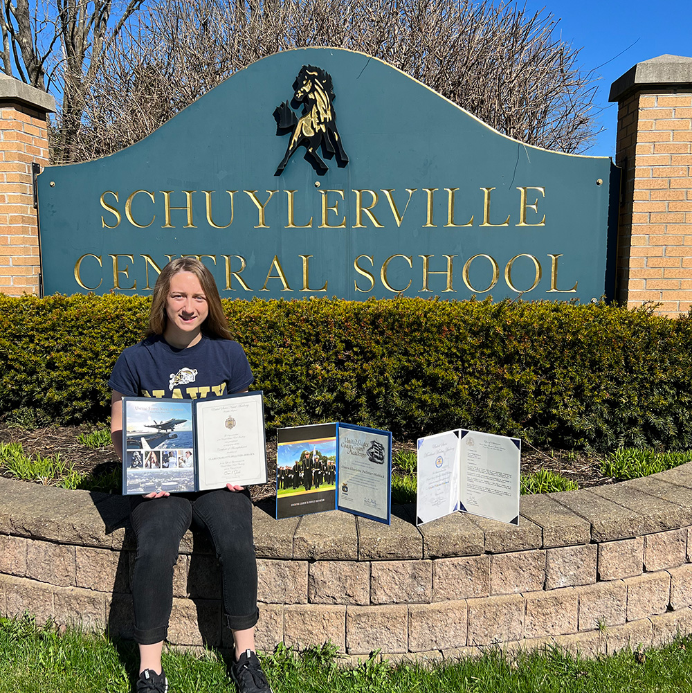 Claire Pelletier-Hoblock with all three of her U.S. military academy acceptance letters.