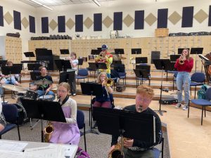 Matt Niedbalski works with the high school jazz ensemble