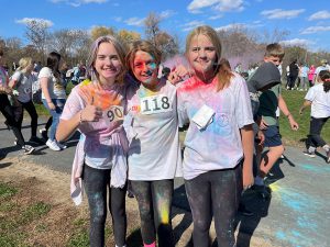 students at the middle school color run