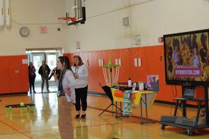 Principal Elsworth & Asst. Principal Wright hold a booster bash kickoff assembly for students.