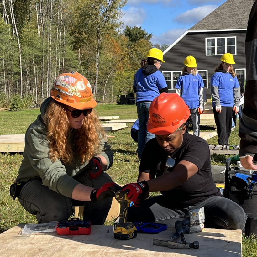 Students work on building a shed