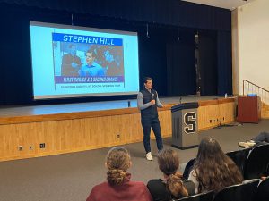 Stephen Hill presents in front of students