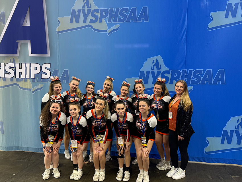 2024 Schuylerville High School varsity cheerleading competition team.