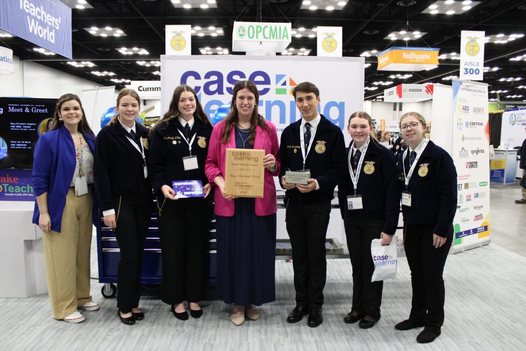 Mary Foote accepts the CASE teacher award at the National FFA convention.