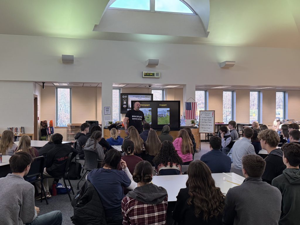 Students begin the summit with a presentation from Jason Spector