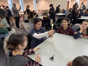 Students work on a group collaboration/leadership activity