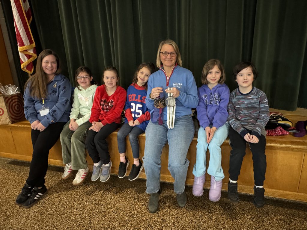 Olympian Amy Peck visits with second grade students