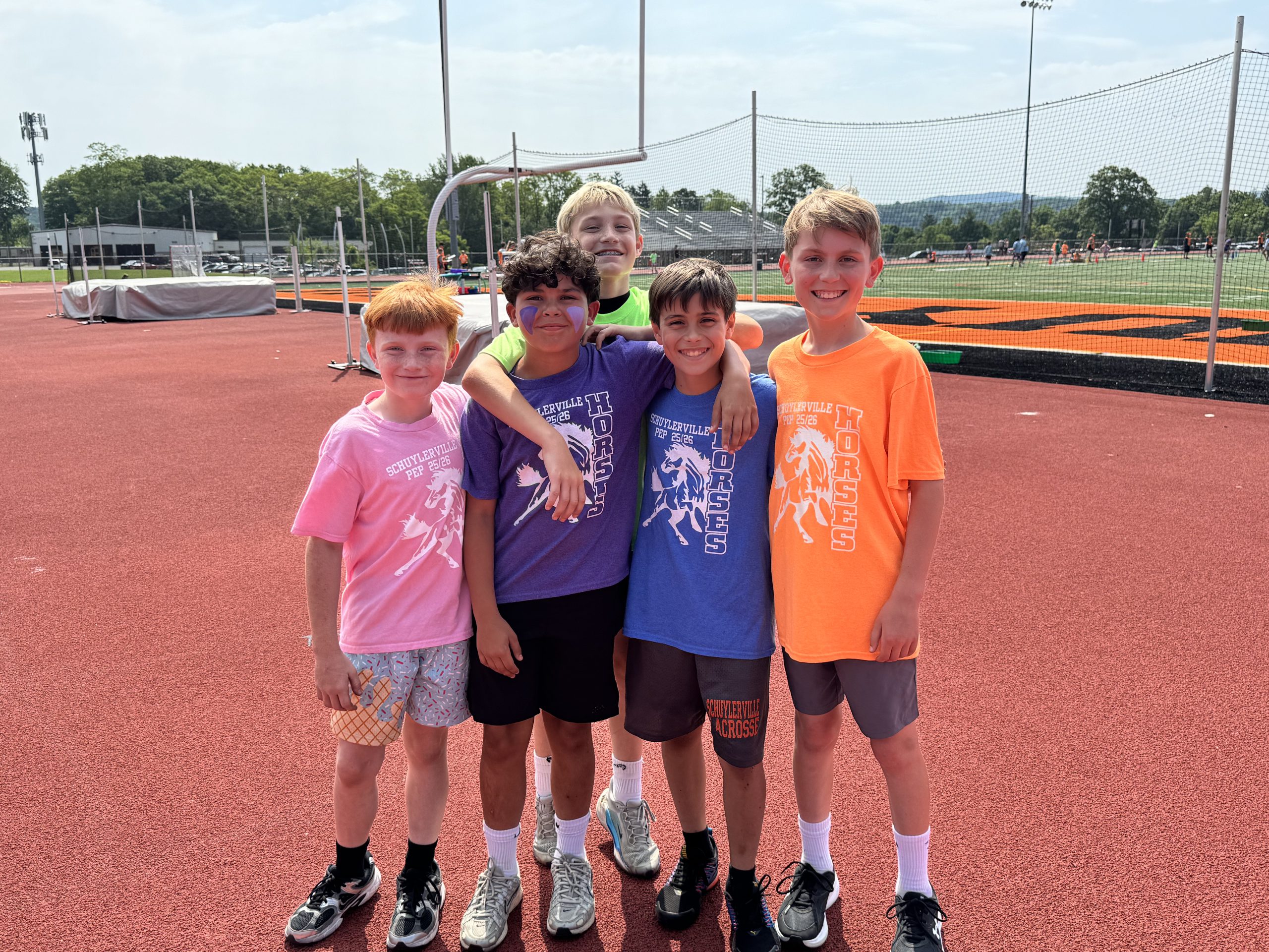 Students celebrate their win after Field Day
