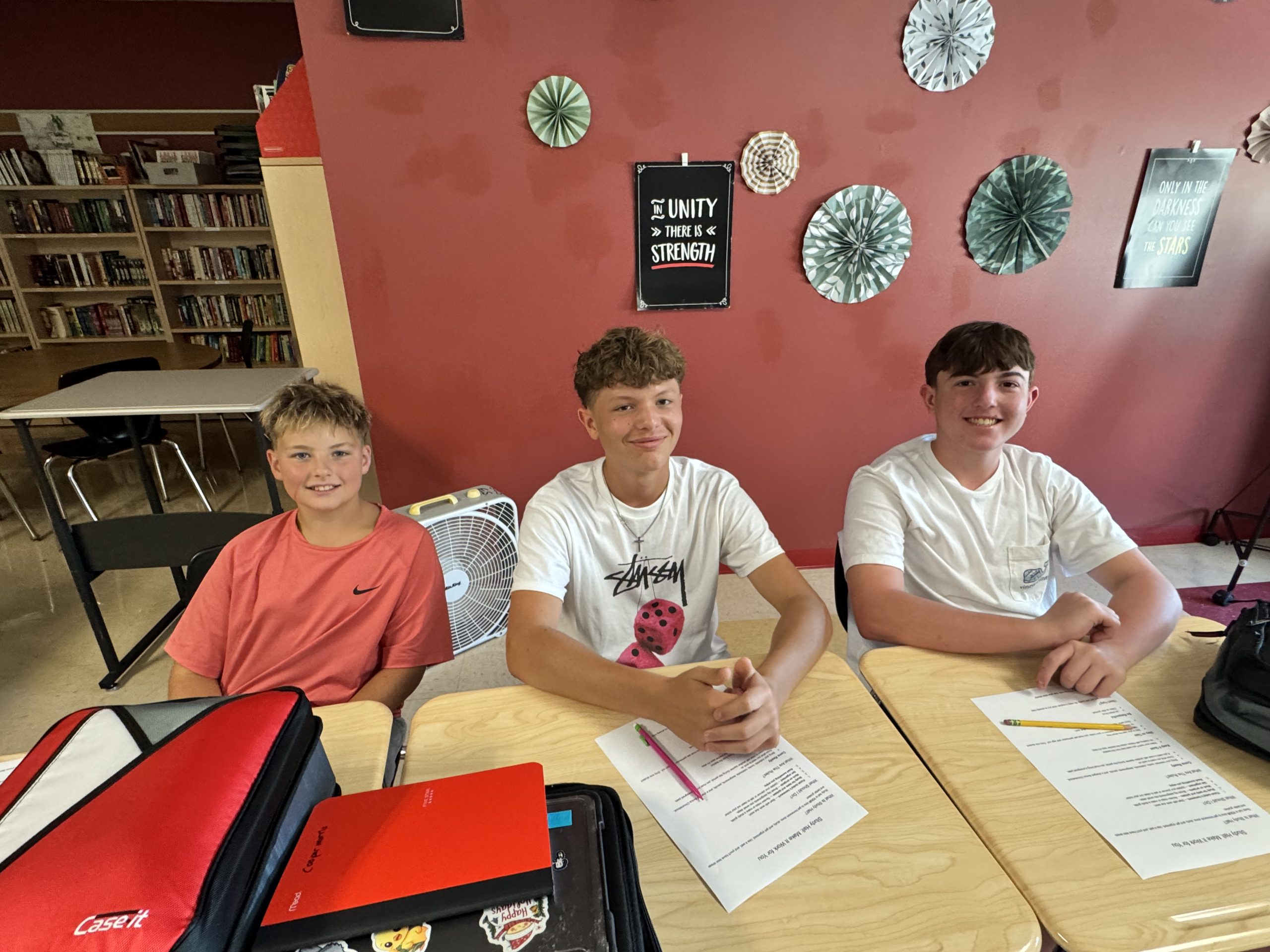 Three middle school students on the first day of school