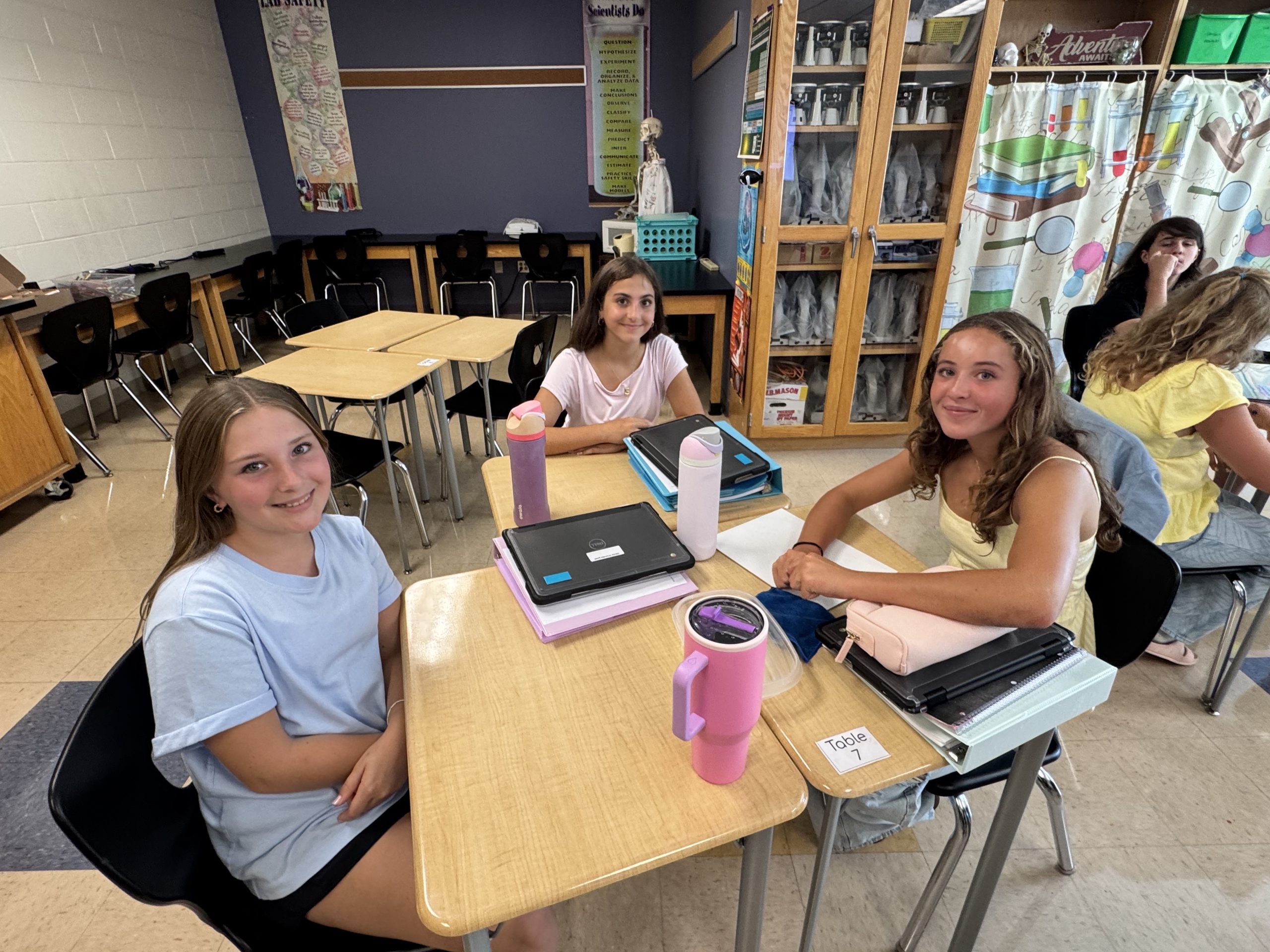 Three students in a middle school class