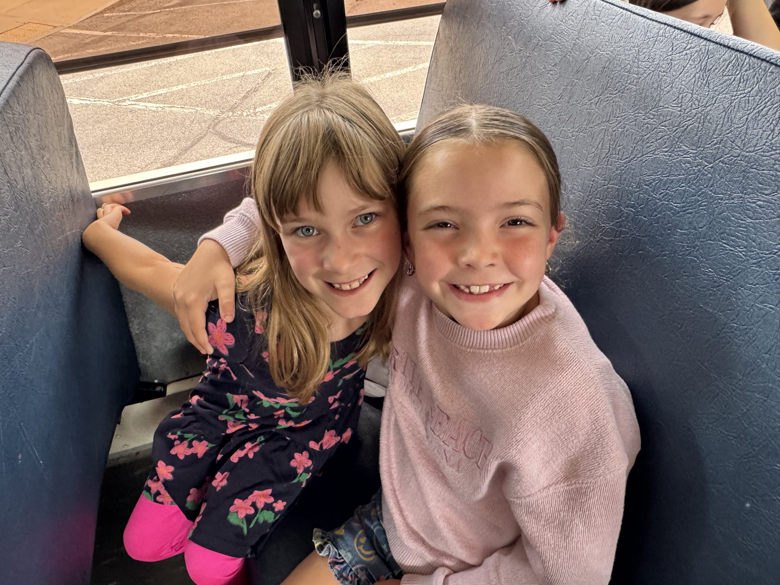 Two students on a bus