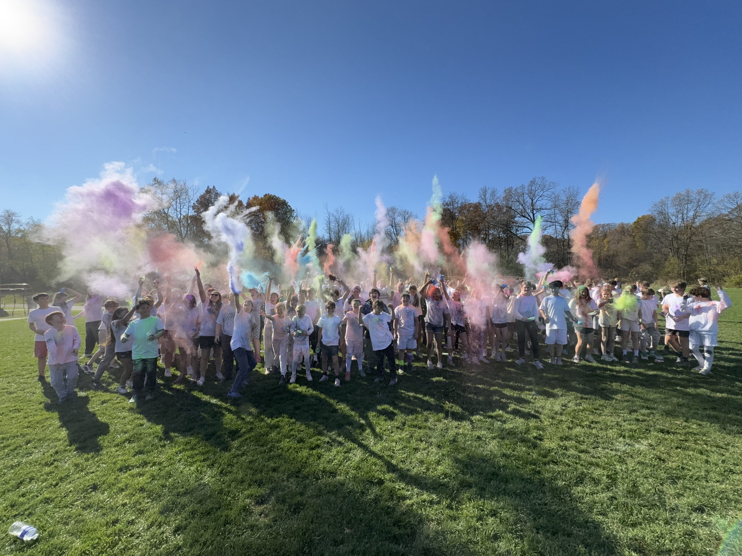 A group picture of the middle school color run at the conclusion